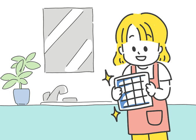 フィルターのお手入れをする女性